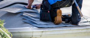 Roofer Repairing A Roof